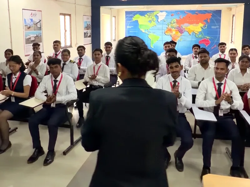 A trainer taking a class of IESP students in uniform
