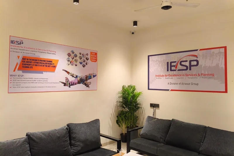 Inside the IESP Roha centre, with the institute signs on the wall